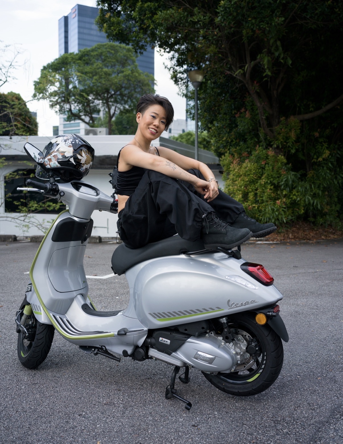 Sharone smiling on her scooter